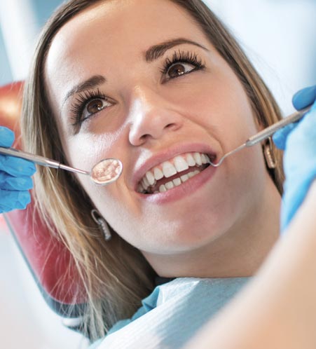 Patient undergoing dental scaling